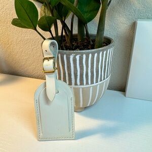 Authentic Louis Vuitton White Leather Luggage Tag